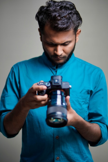 Photographer With Camera on white background.