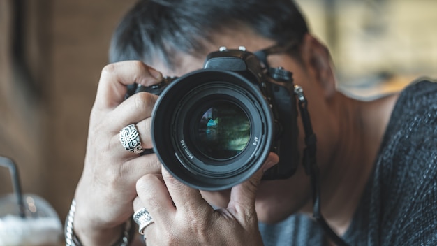 Photographer With A Digital Camera