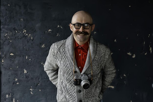 photographer with a vintage analog camera, a man with mustache, funny image learning photography