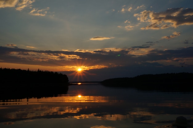 Photography of boat at sunset