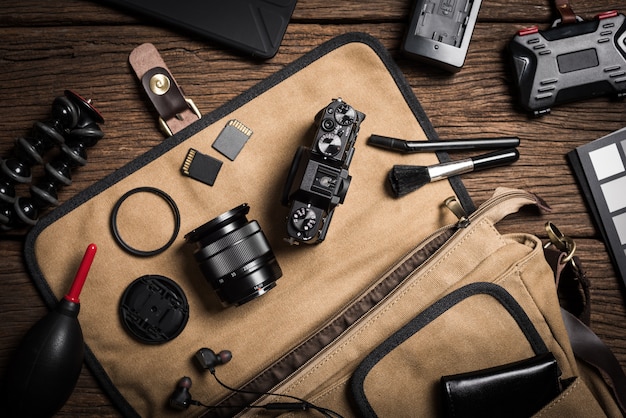 Photography gear on wooden table