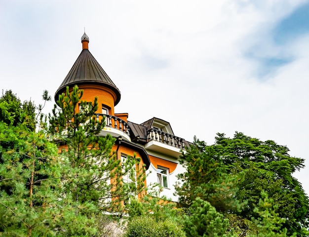 Photography on theme ancient brick castle with large tower on background natural nature photo consisting from ancient brick castle with big tower ancient brick castle with high tower in cloudy sky