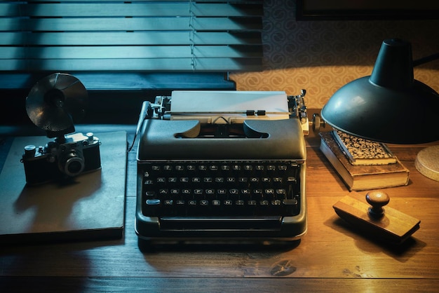 Photoreporter vintage desk with typewriter and old camera communication and creativity concept