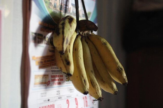 Photos of bananas hanging on the wall