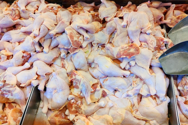 Photos of fresh pork and chicken in a supermarket