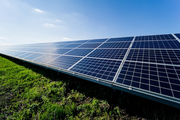 Photovoltaic solar panels on blue sky background