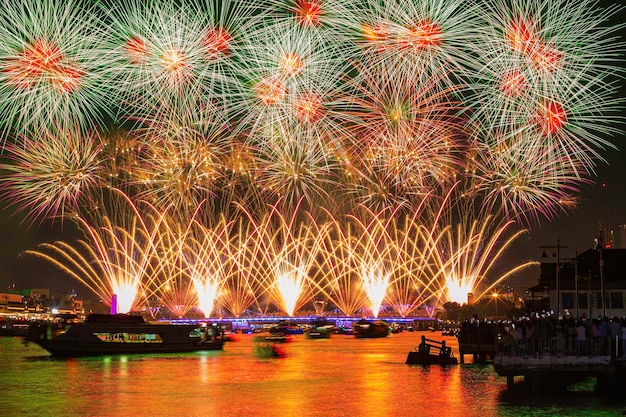 Phra Phuttha Yodfa Bridge or Memorial Bridge light up with fireworks event show 'Vijit Chao Phraya' lighting extravaganza with firework at Memorial Bridge