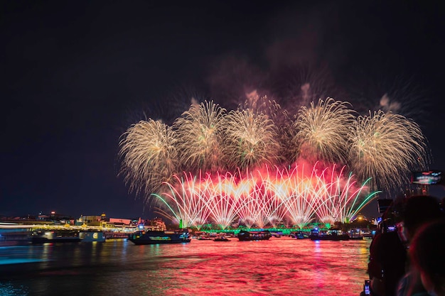 Phra Phuttha Yodfa Bridge or Memorial Bridge light up with fireworks event show 'Vijit Chao Phraya' lighting extravaganza with firework