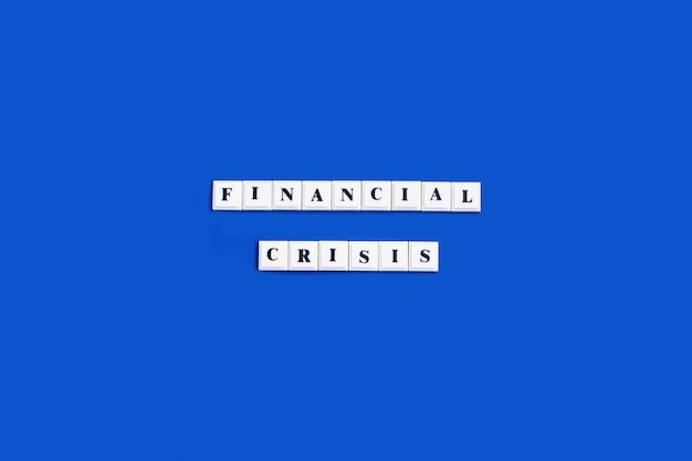 Photo phrase financial crisis made of plastic block letters