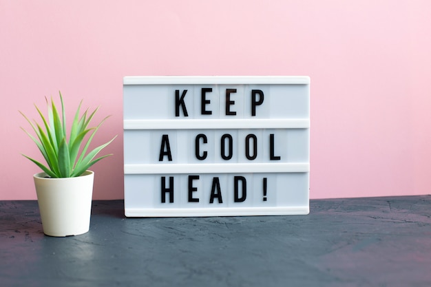 写真 テーブルに「keep a cool head」と入力します。