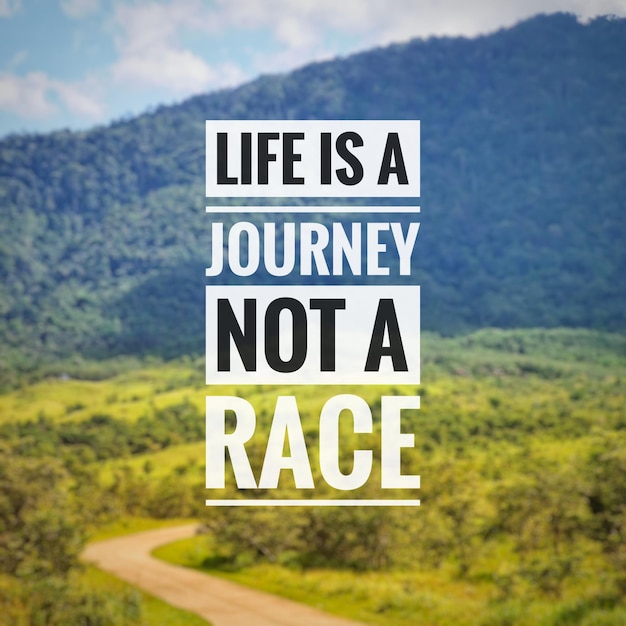 Photo phrase life is a journey not a race. inspirational and motivational quote on blurred background.