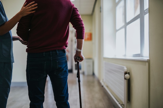 Physiatrist training a patient to walk again