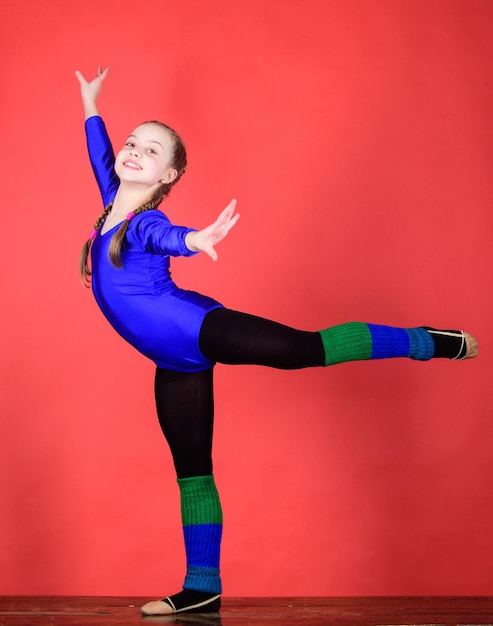 Physical education and gymnastics Flexible healthy body Future star of rhythmic gymnastics Rhythmic gymnastics sport combines elements ballet dance Try hard Girl little gymnast sports leotard