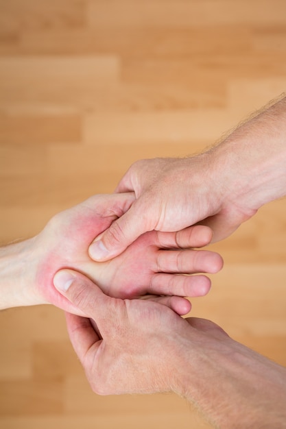 Physiotherapist doing hand massage 