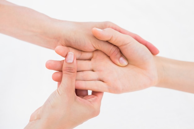 Physiotherapist doing hand massage