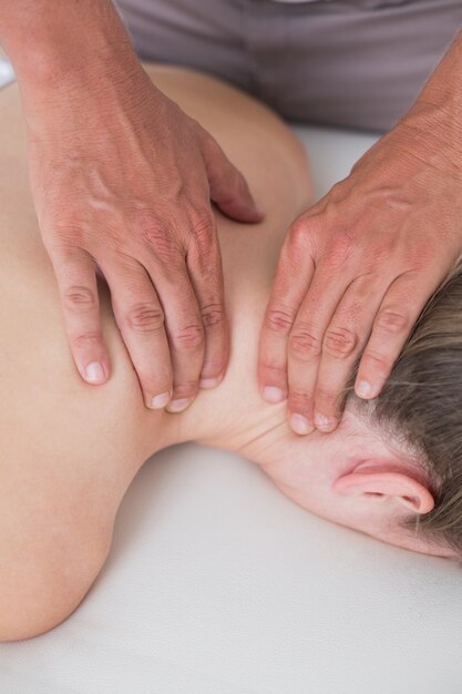 Physiotherapist doing neck massage