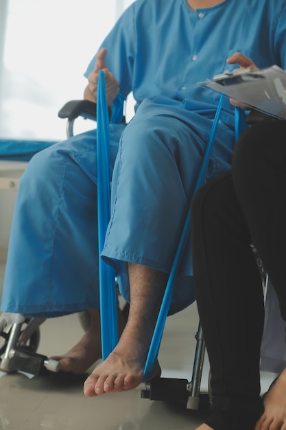 A physiotherapist doing treatment with patient in bright office