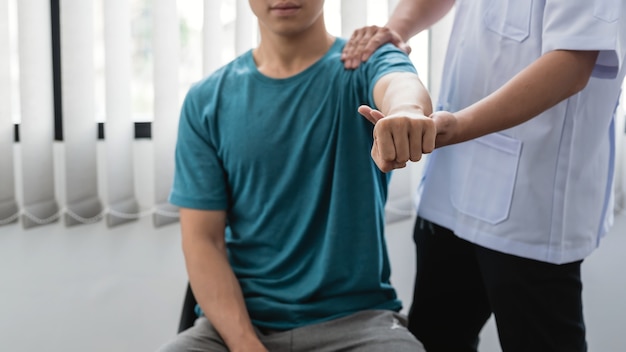 Physiotherapists treating patients at the clinic.