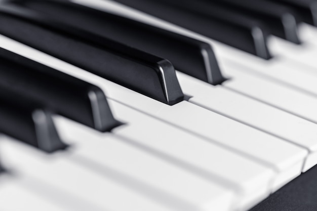 Piano keys close up view. Classical music instrument for playing 