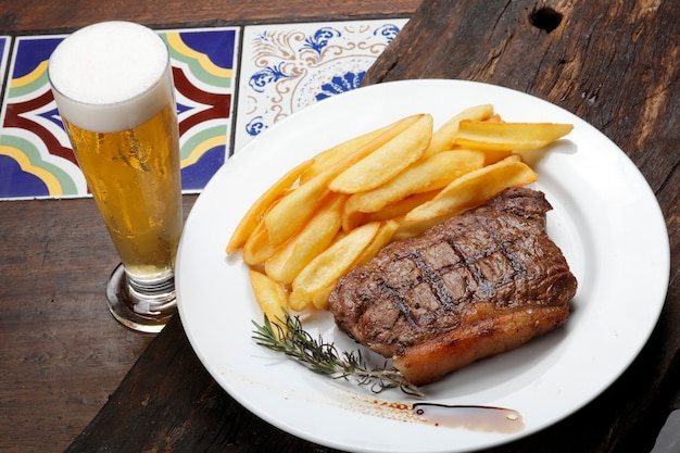 Picanha Steak with fries and beer