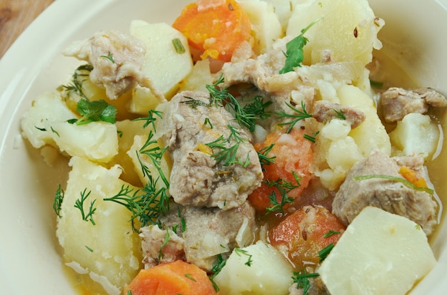 Pichelsteiner -  German stew that contains several kinds of meat and vegetables.vegetables are added, which are usually potatoes, diced carrots and parsley,