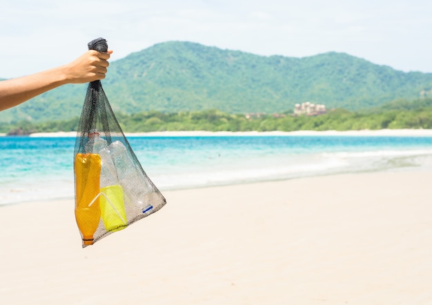 Picking plastic up from the beach Recycle