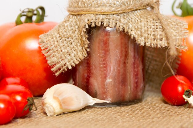 pickled anchovies with rosemary lemon vinegar and tomatoes