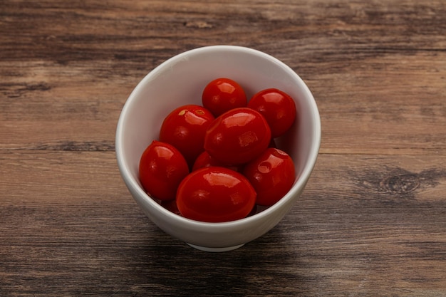 Pickled cherry tomatoes in the bowl