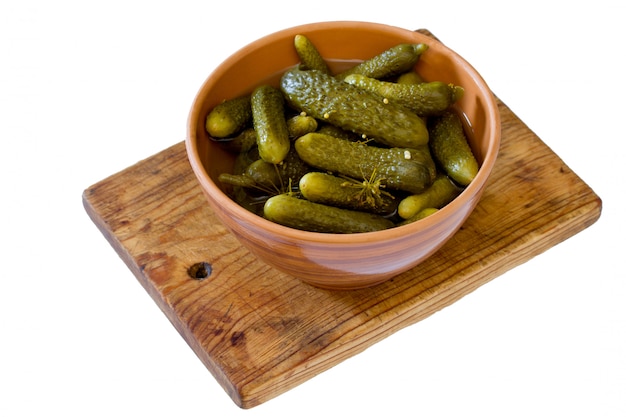 Pickled cucumbers in a ceramic bowl