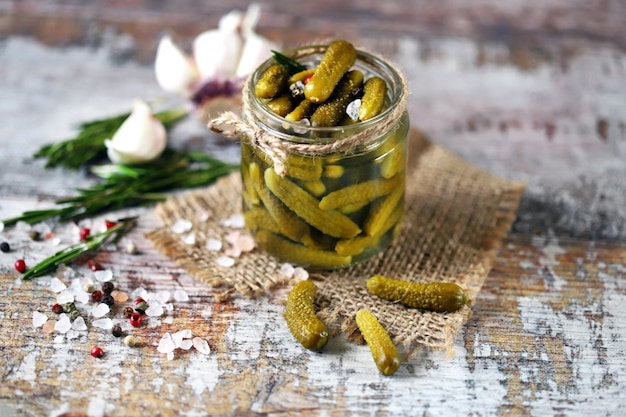 Pickled cucumbers jar. Gherkins in a jar.