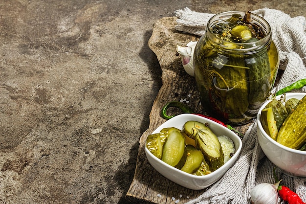 Pickled cucumbers for winter organic food Jar of homemade gherkins clean eating vegan concept