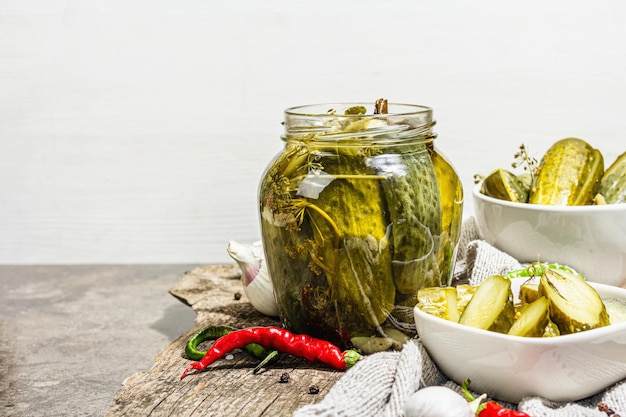 Pickled cucumbers for winter organic food Jar of homemade gherkins clean eating vegan concept