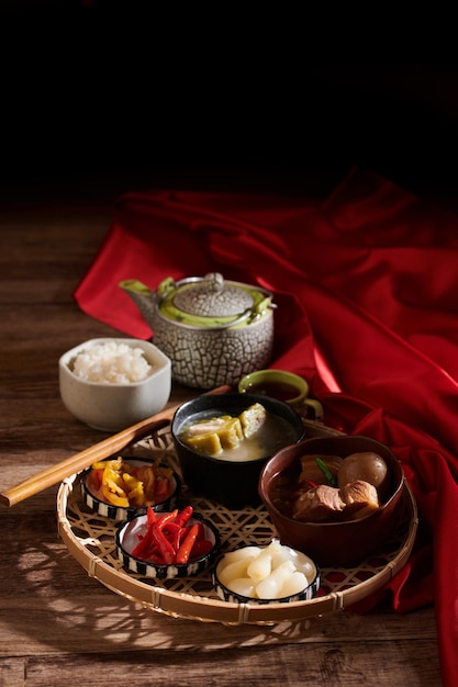 Pickled garlic and chili pepper, braised pork with eggs and stuffed bitter melon soup served for spring festival