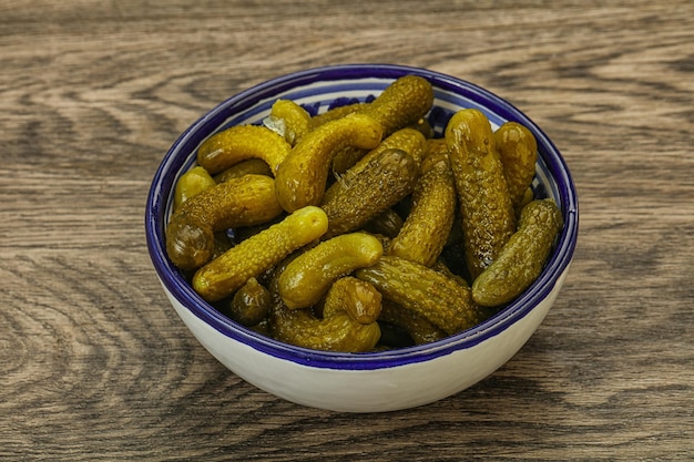 Pickled gherkin in the bowl