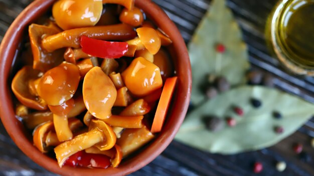 Pickled honey agarics in a bowl