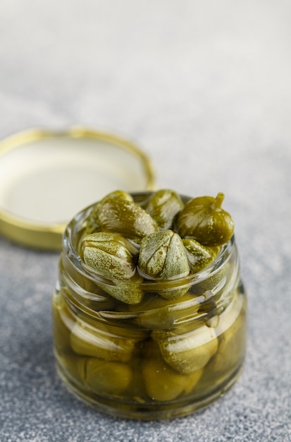 Pickled or salted capers in a jar