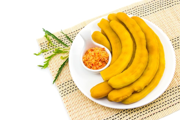 Pickled tamarind preserved in syrup on the market in Thailand