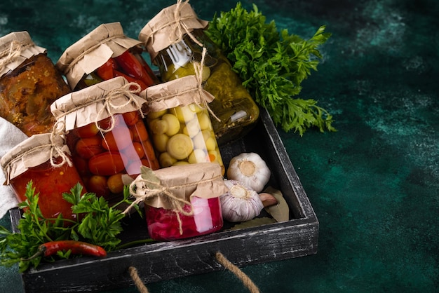 Pickled vegetables in glass jars