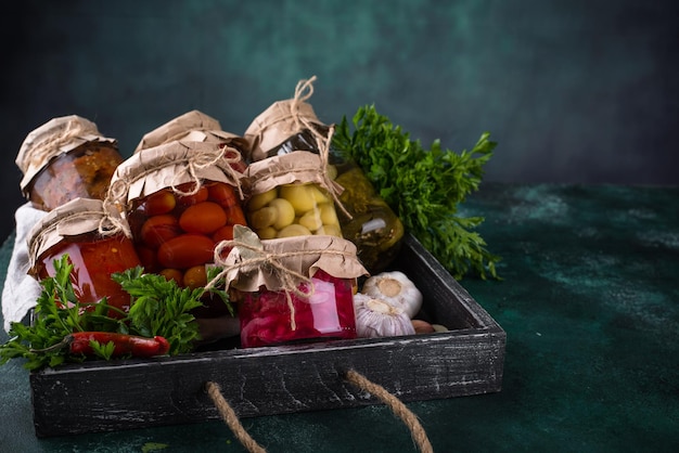 Pickled vegetables in glass jars