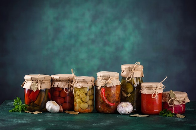 Pickled vegetables in glass jars