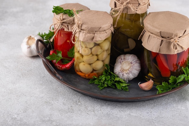 Pickled vegetables in glass jars