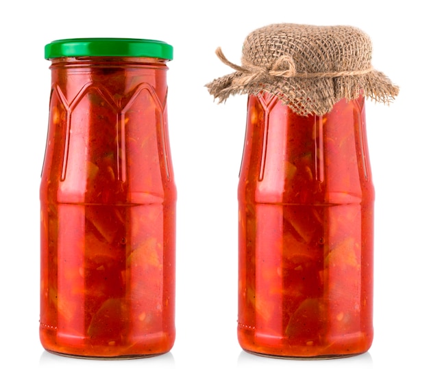 Pickled vegetables in jar isolated on white background.