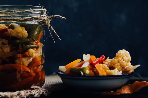 Pickled Vegetables, vinegar, carrot, onion, cauliflower, pods and sweet pepper.