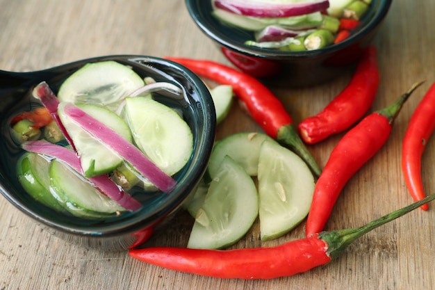 Pickles cucumber and onion in vinegar