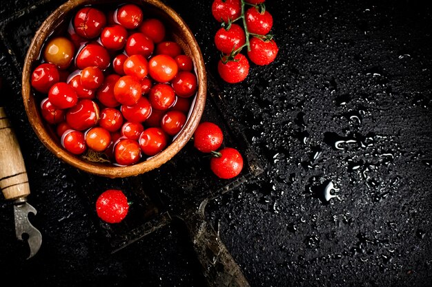 Pickling ripe homemade tomatoes on the table