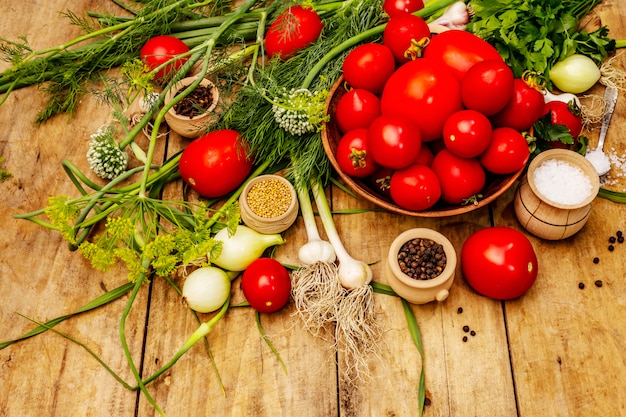 Pickling vegetables concept. Cooking process, spices, fresh fragrant herbs