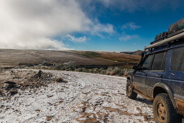 pickup truck in the midst of a heavy frost in the cold icecovered mountains in the city of urubici