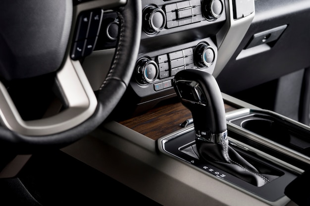 Pickup truck with the most luxurious interiors, automatic gear lever close up, designed for comfortable driving