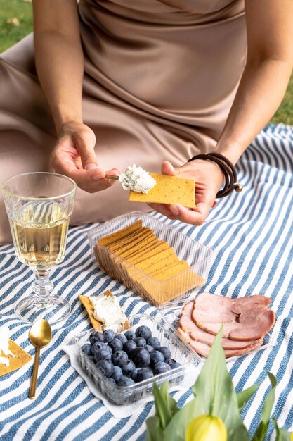 Picnic in the park with berries and crackers