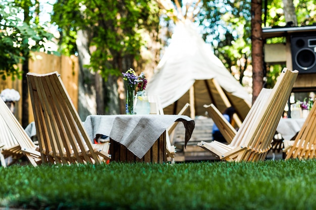 Picnic tables and chairs on a garden